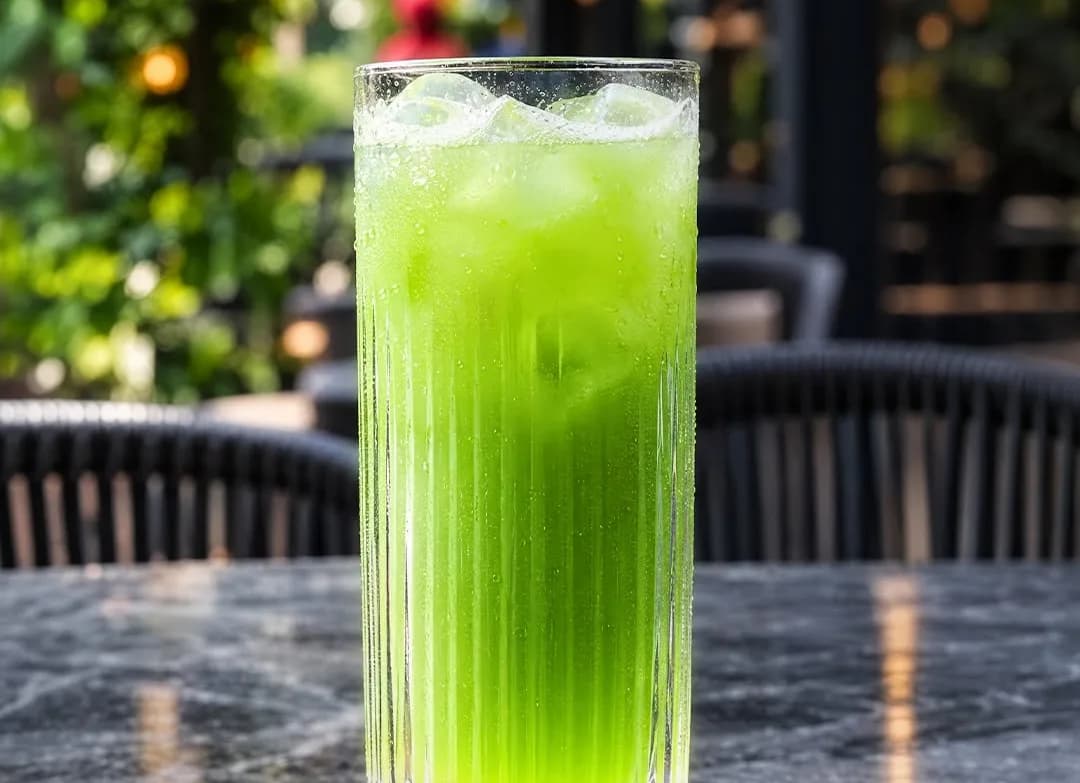 A green cocktail on the terrace
