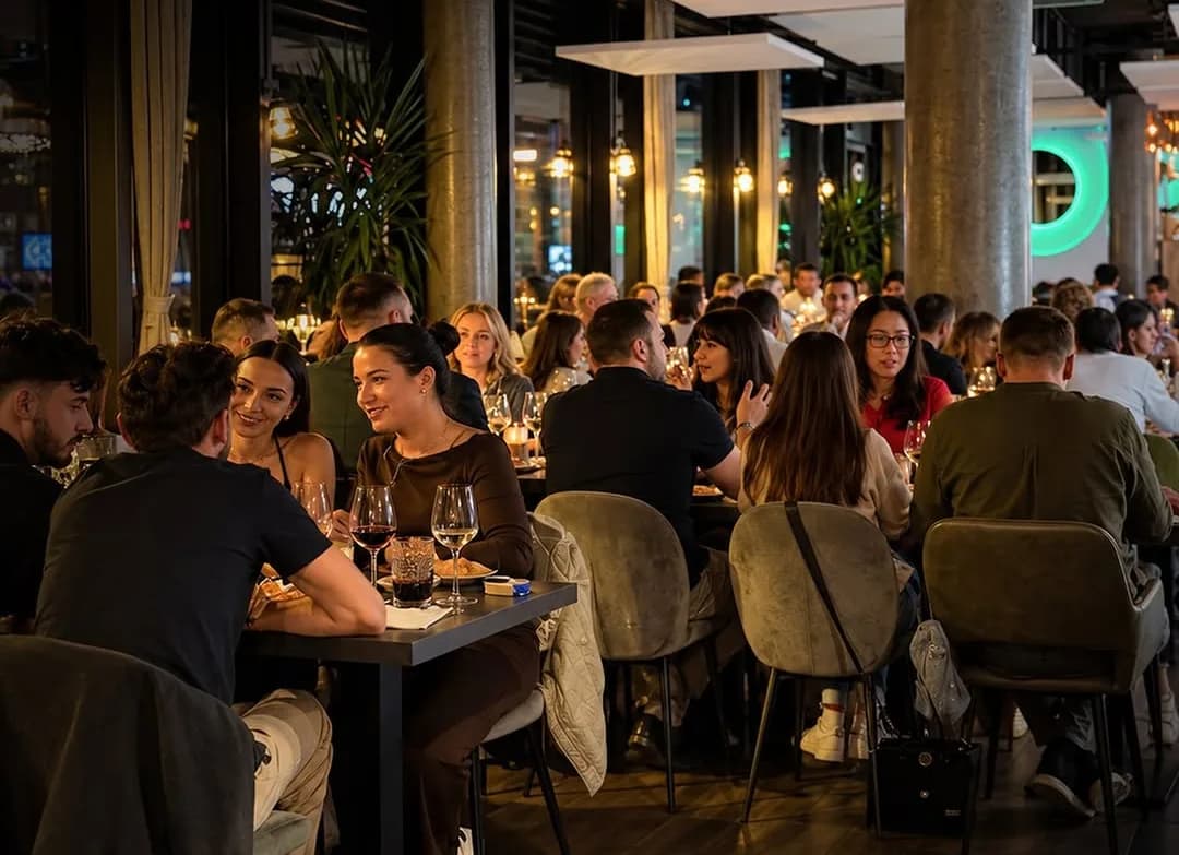 The dining room on a weeknight, every table taken